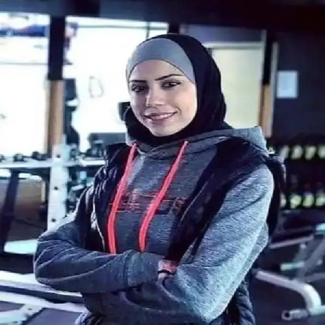 Coach Muna Sharqawi logo